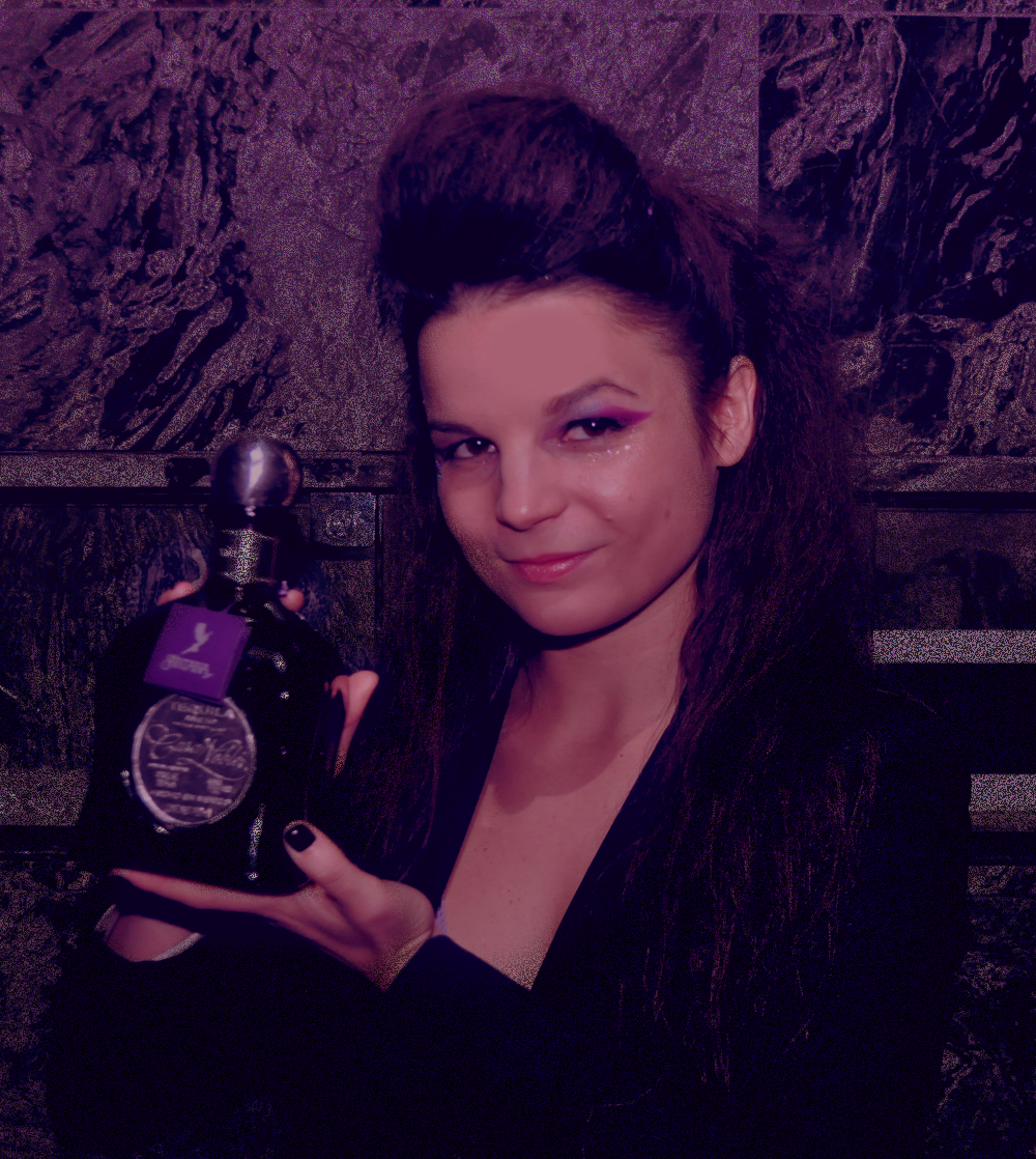 Alisha Holding a Casa Noble Bottle