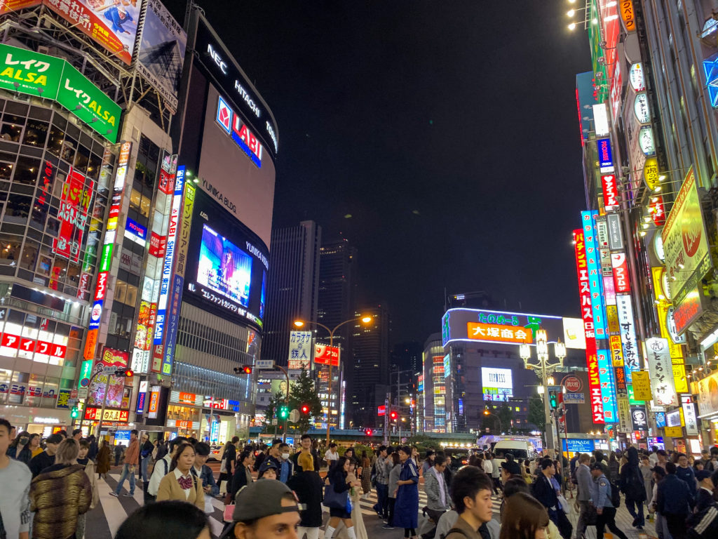 Intersection in front of Kabukicho at night in Shinjuku, Tokyo. iPhone 11 Pro standard camera.