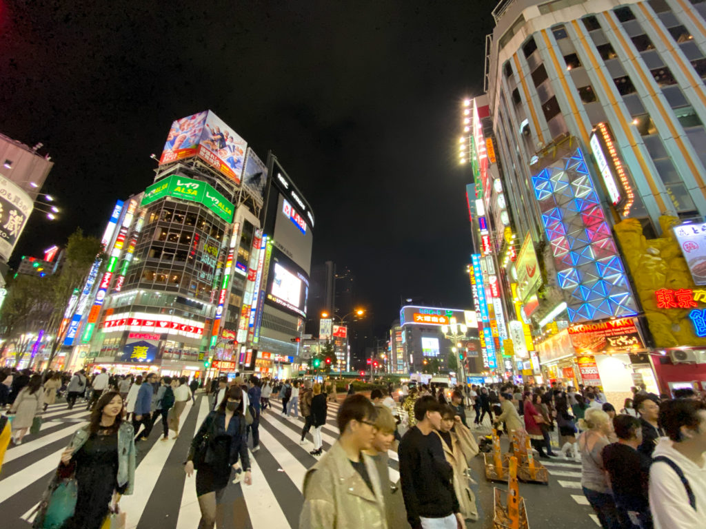 Intersection in front of Kabukicho at night in Shinjuku, Tokyo. iPhone 11 Pro super wide angle amera.