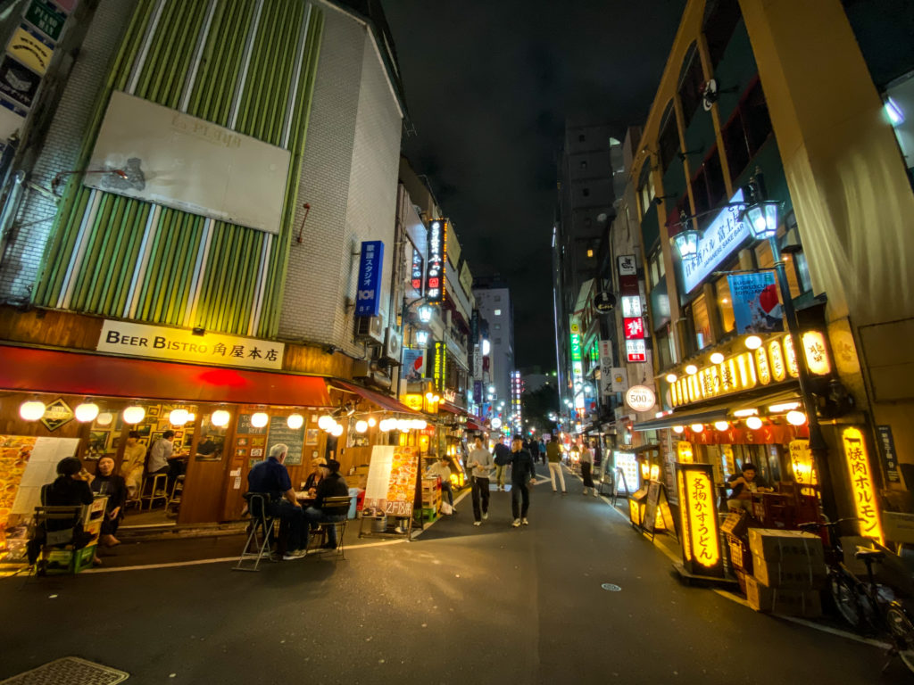 Backstreet of Shinjuku San-chome in the evening. iPhone 11 Pro super wide angle lens.