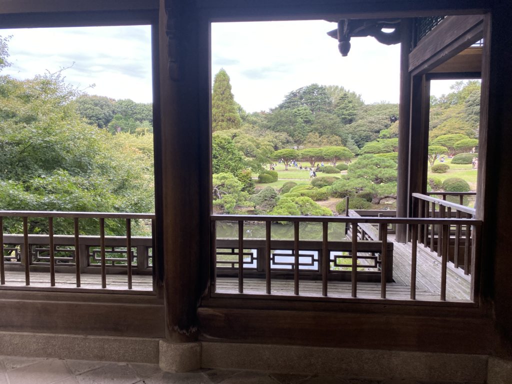 Looking out of a temple across a pond at Shinjuku park. iPhone 11 Pro camera.