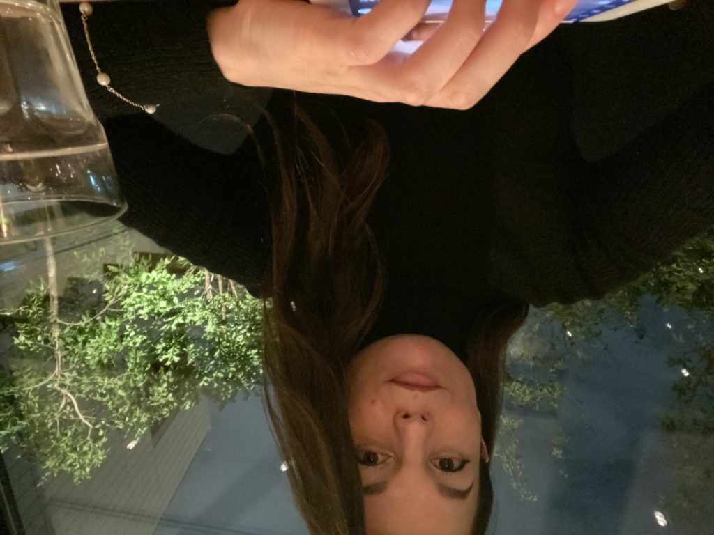 Low light selfie of Alisha. Iphone 11 Pro front-facing camera.