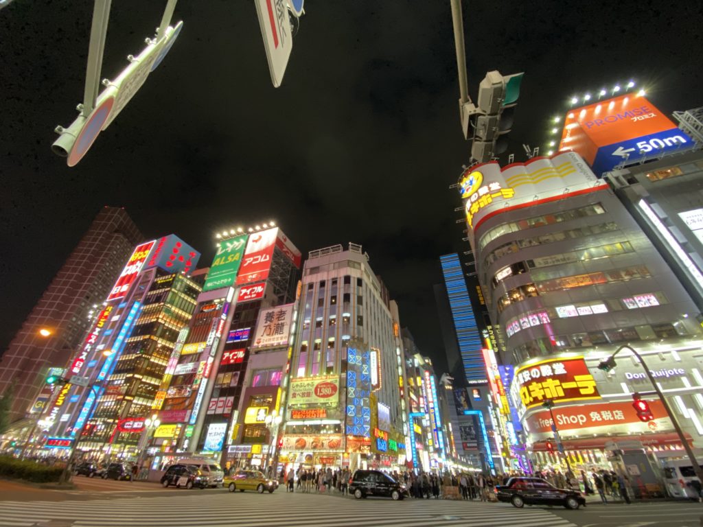  Entrance to Kabukicho at night in Shinjuku. iPhone 11 Pro super wide angle lens.